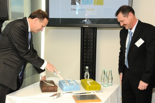 The cutting of the cake with the Hon John Key and LHF GM Bennie Hendricks